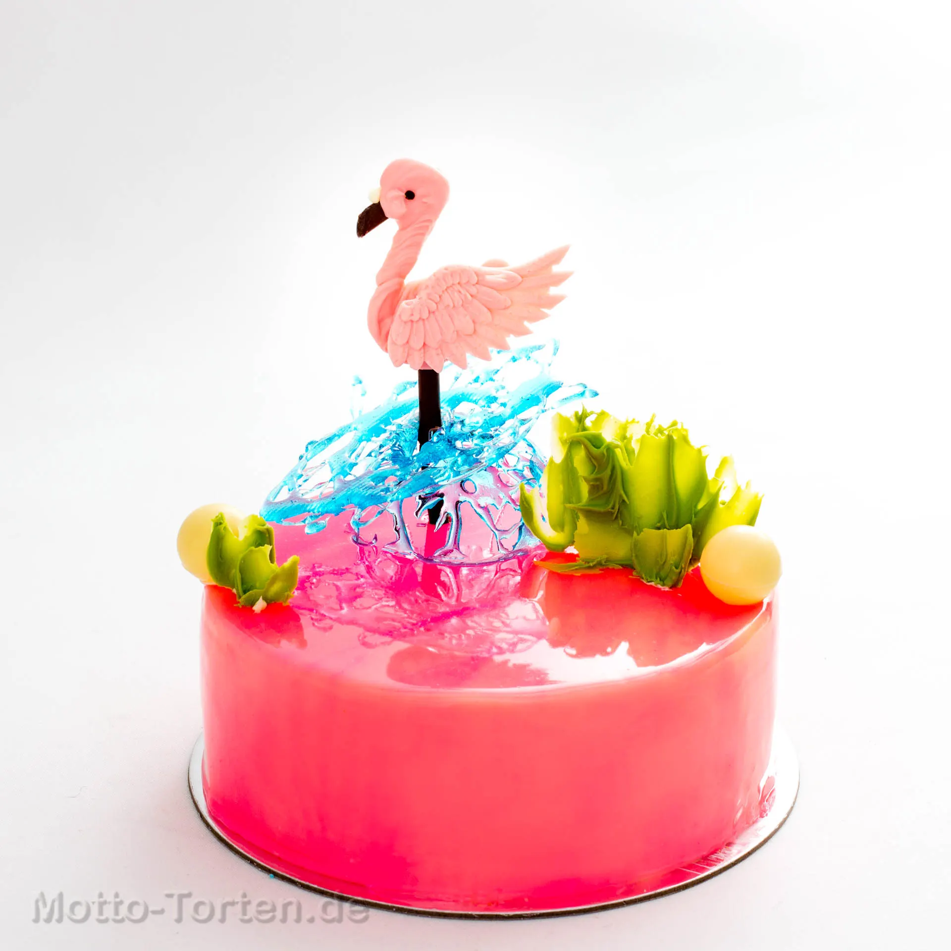 Törtchen mit Spiegelglasur und Flamingo-Motiv