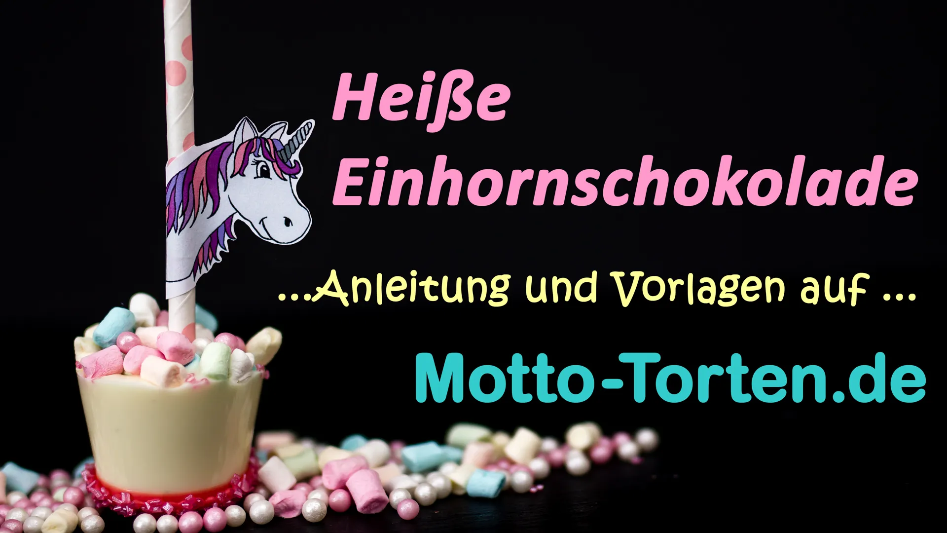 Heiße Schokolade am Stiel mit aufgesetztem Einhornkopf aus Papier, rosa überzogen und mit Zuckerstreuseln