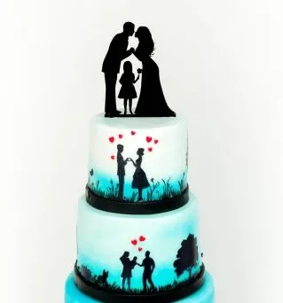 Detailbild der Hochzeitstorte mit Silhouetten